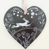 Hare leaping in starlight on wood