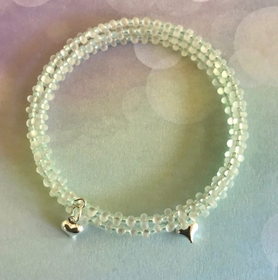 Beaded Memory Wire Bracelet With Heart Charms