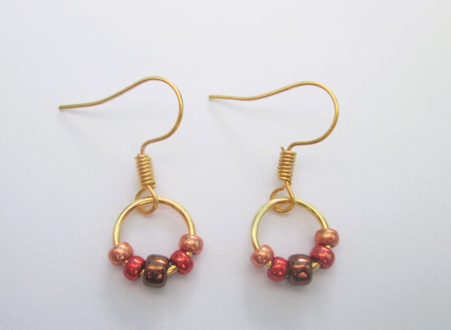 Tiny gold plated bead hoop earrings in earth tones colours