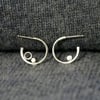 Coastal silver mismatched tiny hoop earrings