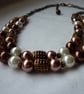 CINNAMON, BRONZE, OLD GOLD AND IVORY TWO STRAND NECKLACE.  752 - Image 1