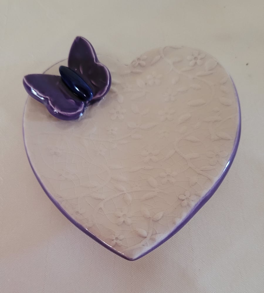Floral embossed heart ring dish with a purple butterfly