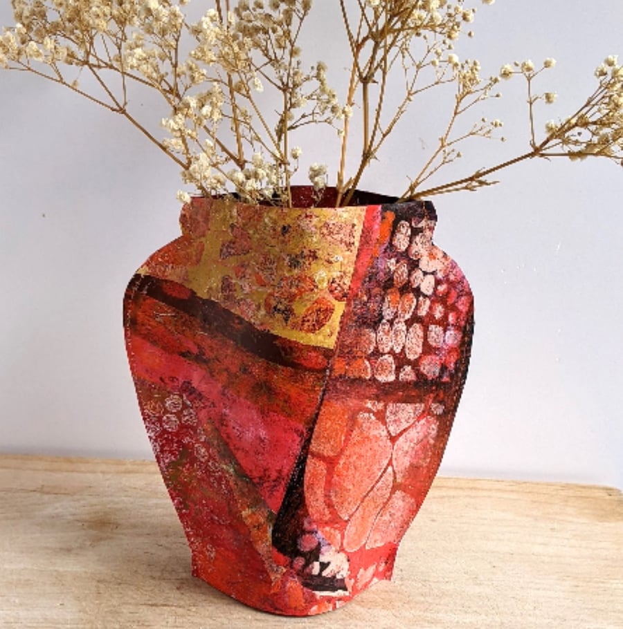 Paper vase cover, reds, oranges and gold abstract design