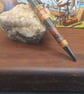 Resin and pine cone tipped pen
