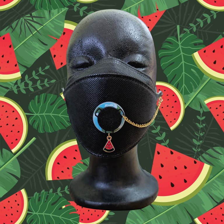 Black SIP valve cap with watermelon charm and gold keeper