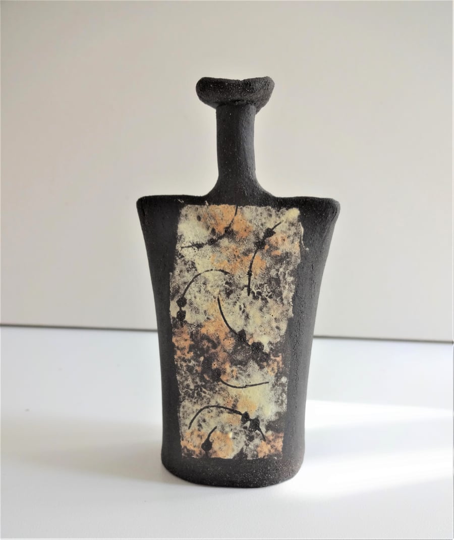 Jasper. Sculptural abstract ceramic form, lemon and yellow on black stoneware.