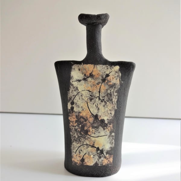 Jasper. Sculptural abstract ceramic form, lemon and yellow on black stoneware.