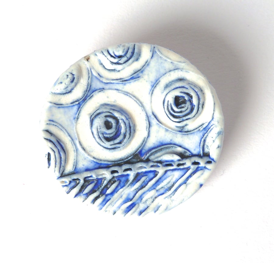 A unique stamped porcelain brooch, hand made in Winchester