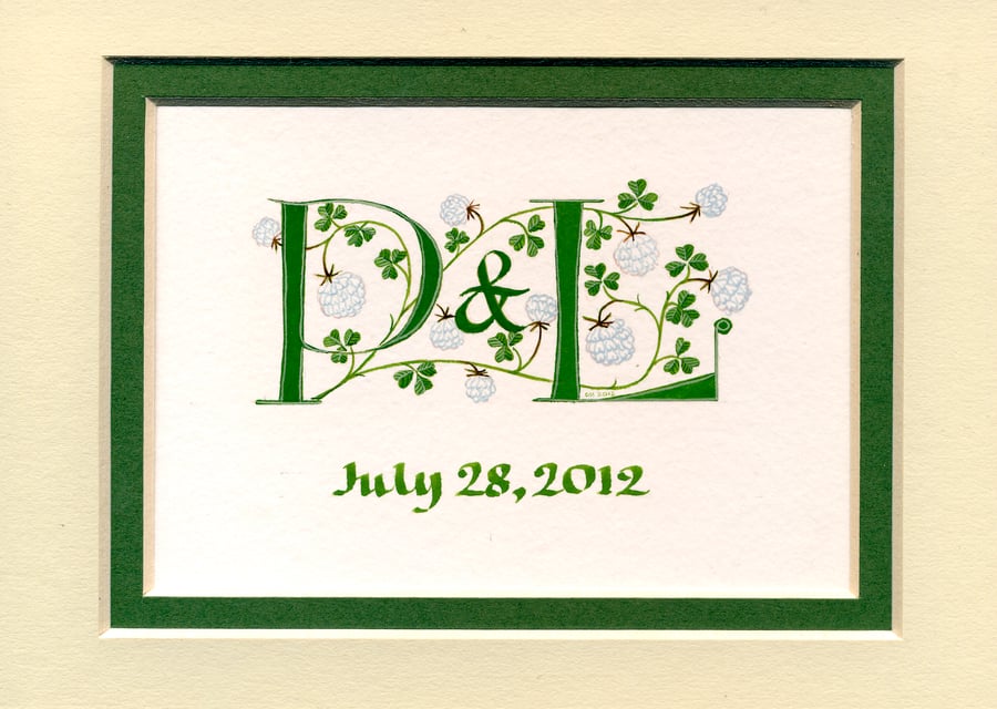 Double initials in green with white clover wedding anniversary gift.