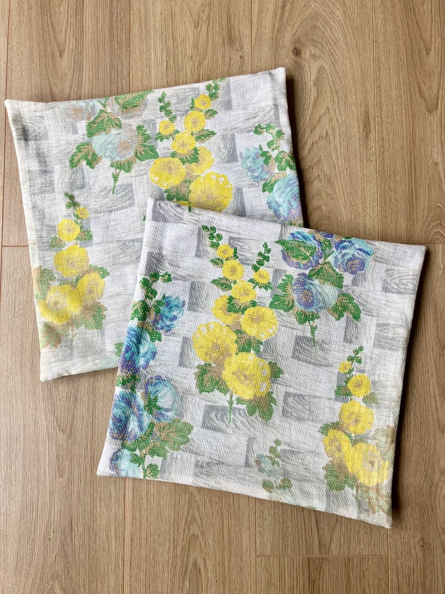 Two 45cm square floral cushion covers newly hand-made with vintage fabric