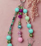 Green and pink handbag charm