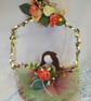 Autume Fairy doll on hoop with fairy lights and orange roses
