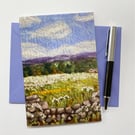 Meadow sweet field with Ilkley Moor in the distance. Spring summer countryside. 