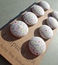 Set of eight scrap bag buttons - grey cotton fabric with colored circle design 