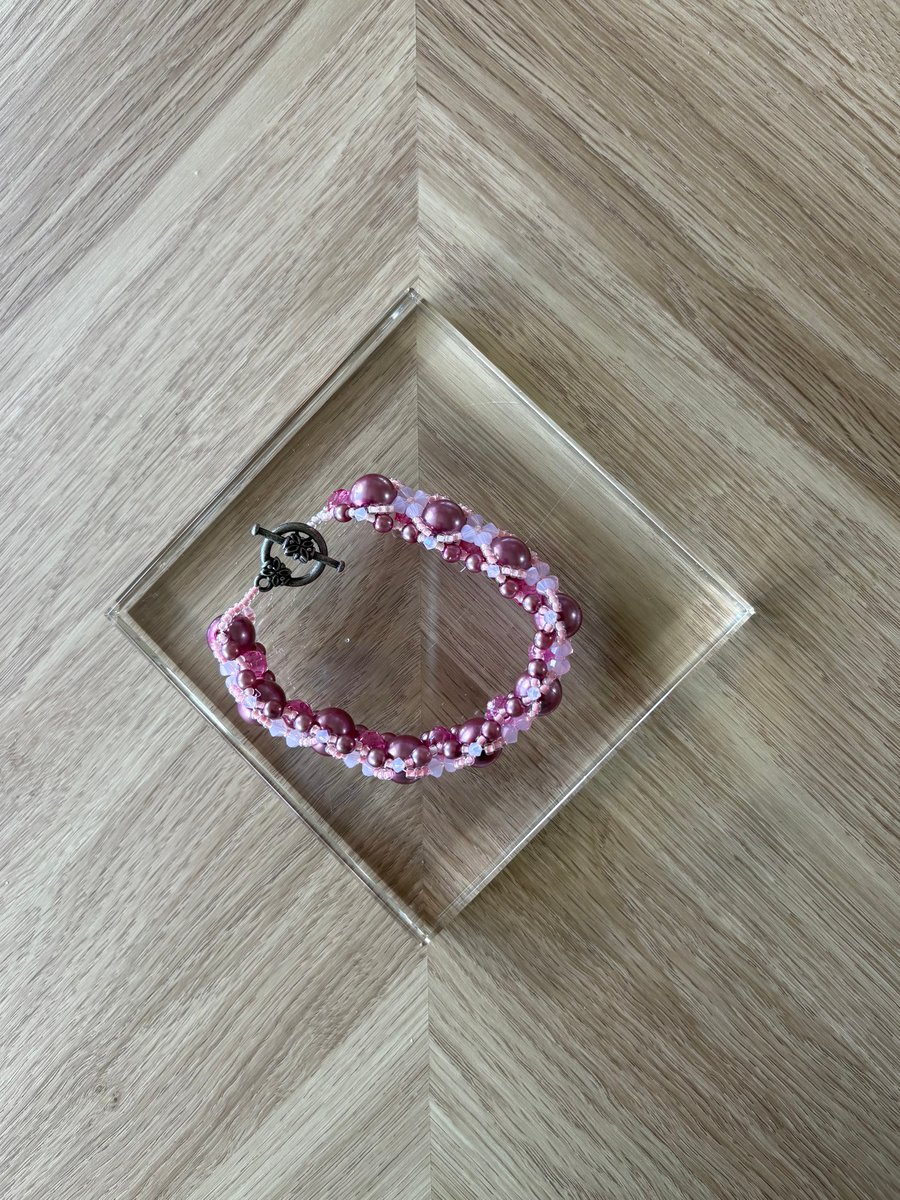 Pink woven beaded bracelet 