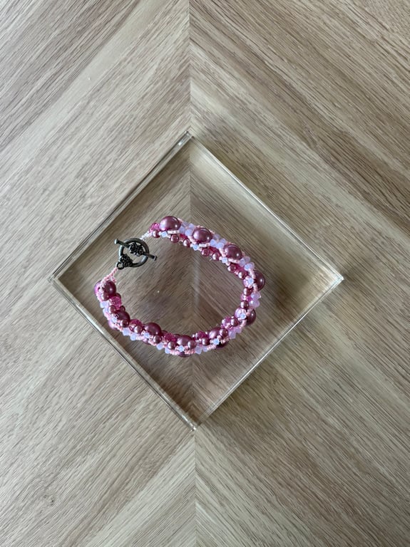 Pink woven beaded bracelet 
