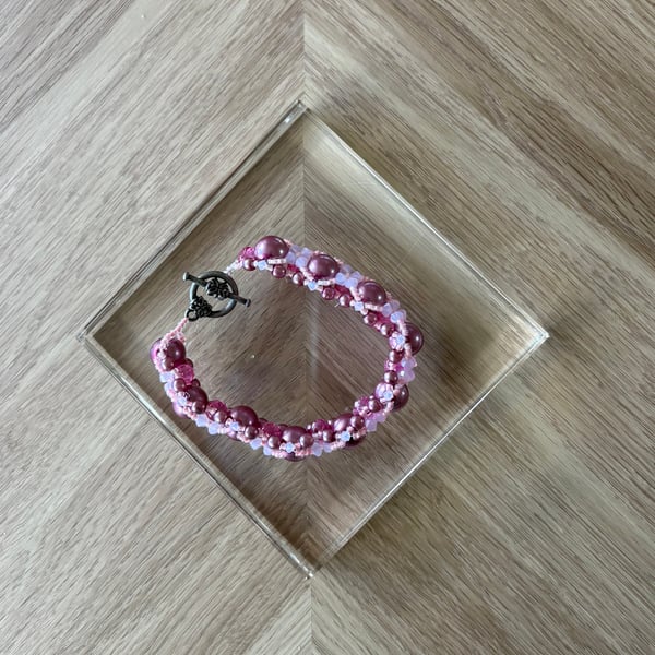 Pink woven beaded bracelet 