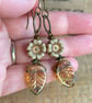 Amber Czech Glass Leaf Earrings with Rustic Cream Flowers and Antiqued Brass - Image 1