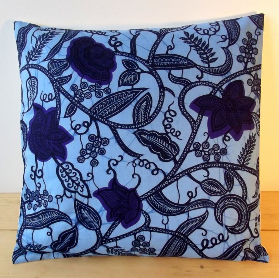 Cushion cover. African wax print, indigo and purple on light blue