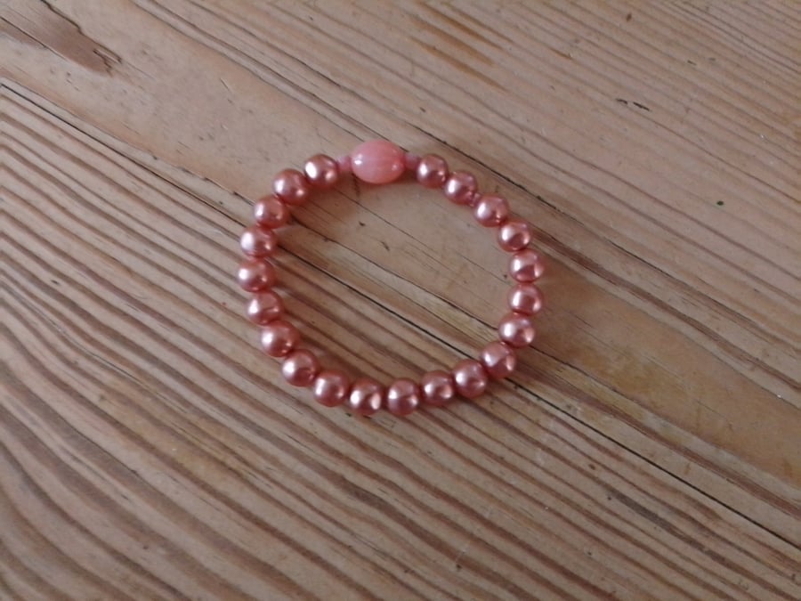 Handmade bracelet made using pre-loved beads. Small size.