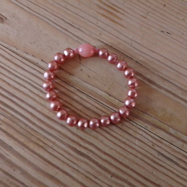 Handmade bracelet made using pre-loved beads. Small size.