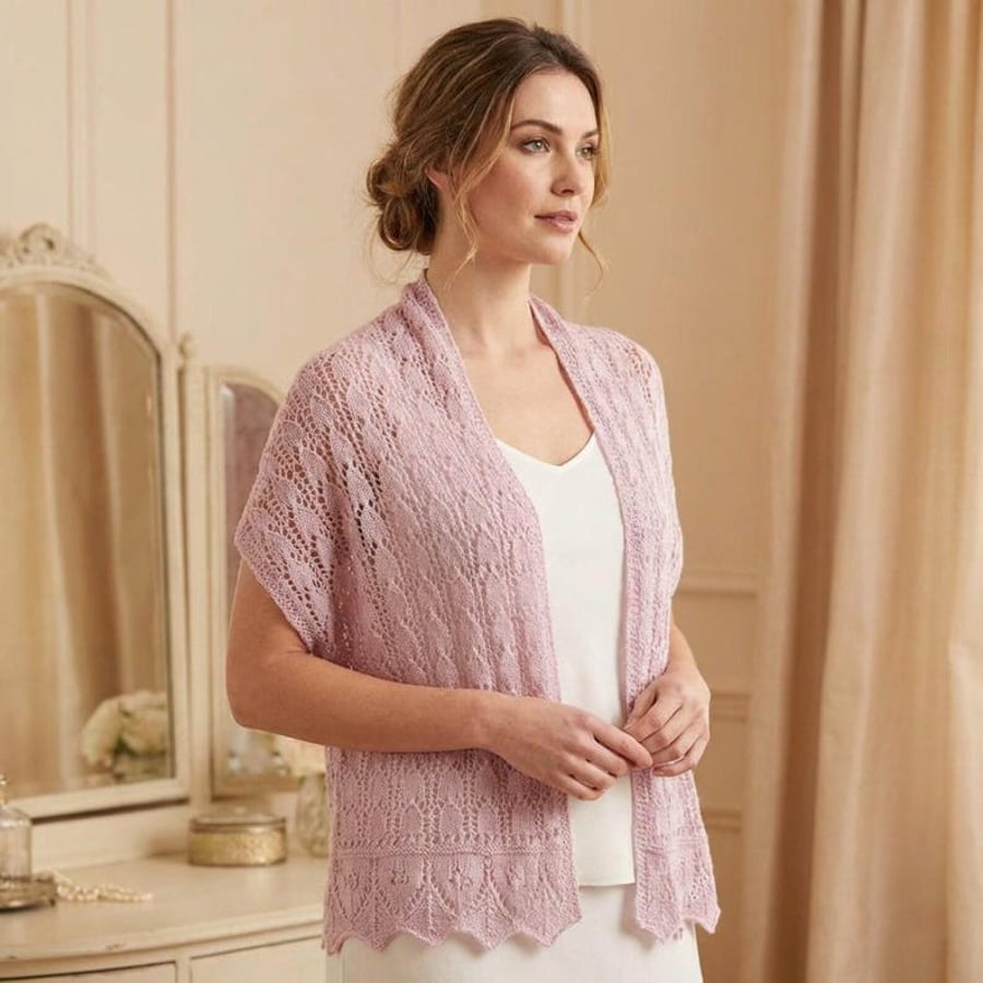 Ladies lacy shawl or wrap hand knitted in light pink alpaca yarn