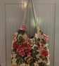 Two bags in one.  Lined tote bag