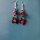 Red and black beaded spider dangle earrings 
