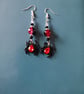 Red and black beaded spider dangle earrings 