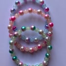 Set of three colourful glass beaded bracelets