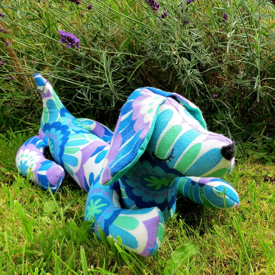 Patchouli, a groovy retro dog doorstop.  1970s flower power.