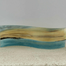 Hand painted fused glass sunset over the ocean freestanding wave panel