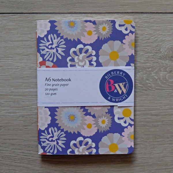 Handmade A6 notebook with a blue floral patterned cover