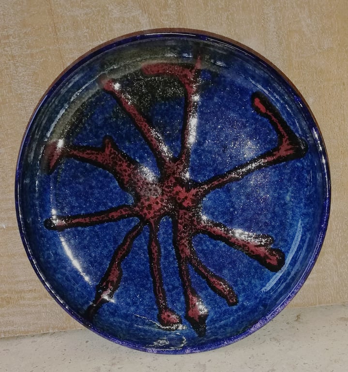 Shallow ceramic abstract decorated bowls