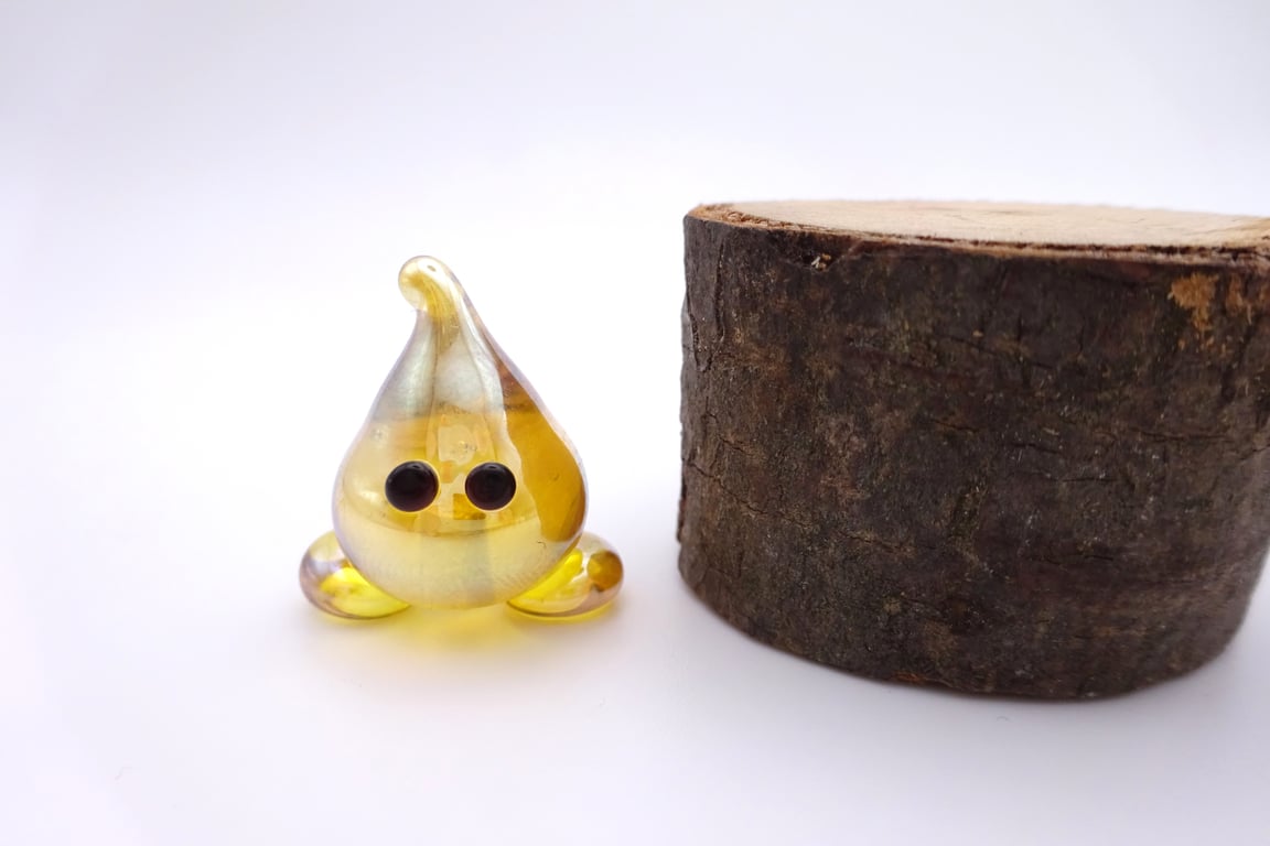 small glass wisp figure