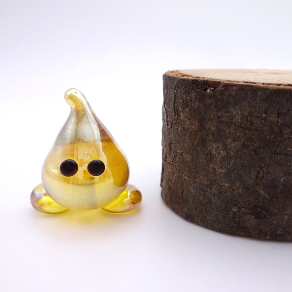 small glass wisp figure