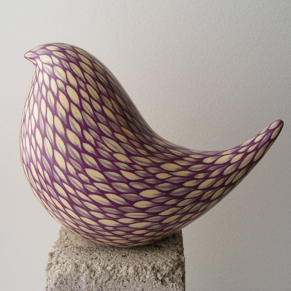 Painted bird (D) cream on blackberry