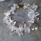 Bracelet from clear quartz chips with brass clasp
