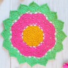 large, bright, crochet doily, mandala table mat