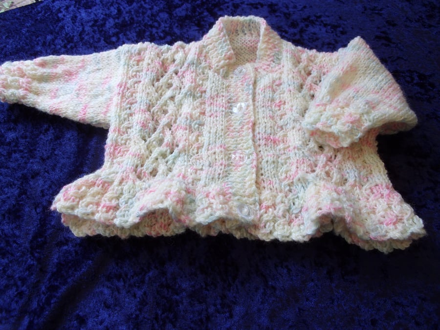 Girls cardigan with lacy panels and cable frilled border