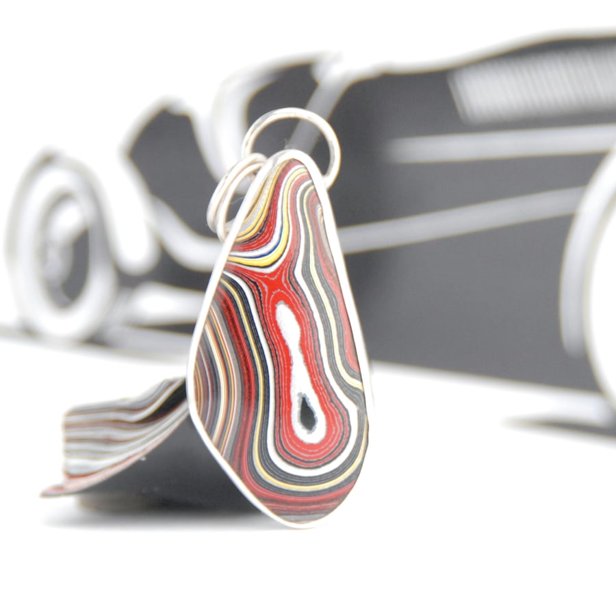 Sterling silver and corvette fordite pendant
