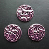 set of three large purple ceramic buttons 