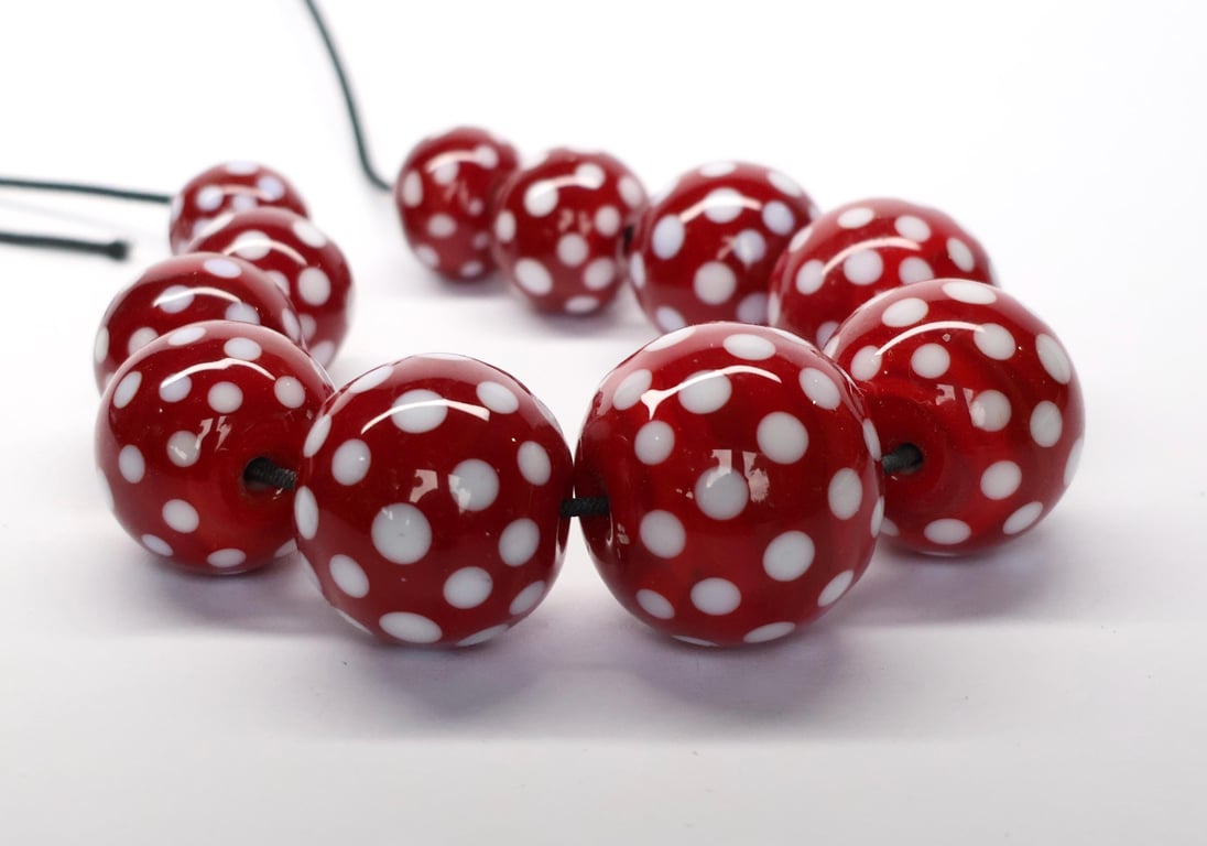Handmade red and white patterned lamp work glass beads