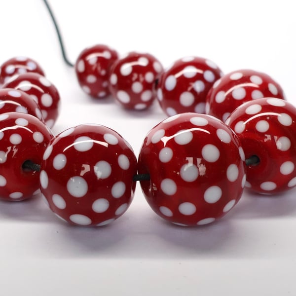 Handmade red and white patterned lamp work glass beads