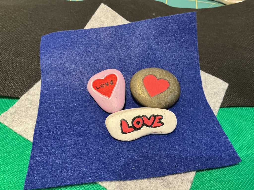Set of 3 hand painted pebbles with Love theme.