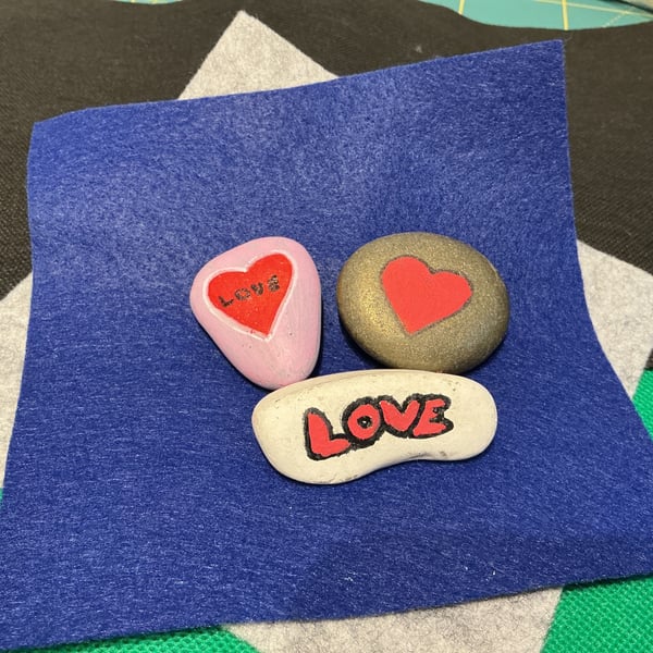 Set of 3 hand painted pebbles with Love theme.