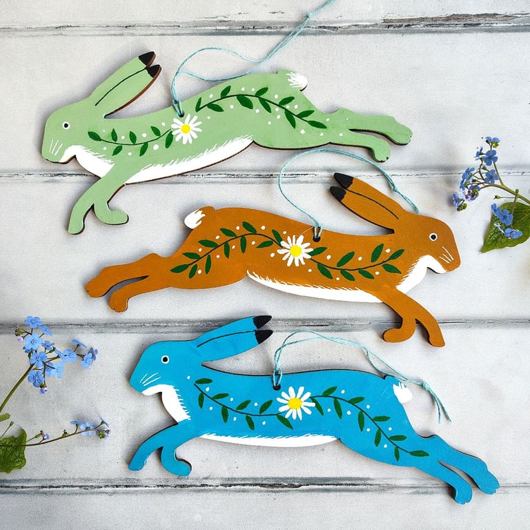 Whimsical folk style leaping hare hanging decoration for cottage core decor