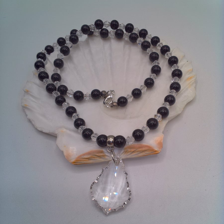 Small Crystal Baroque Style Pendant on a Black and Clear Bead Necklace, Necklace