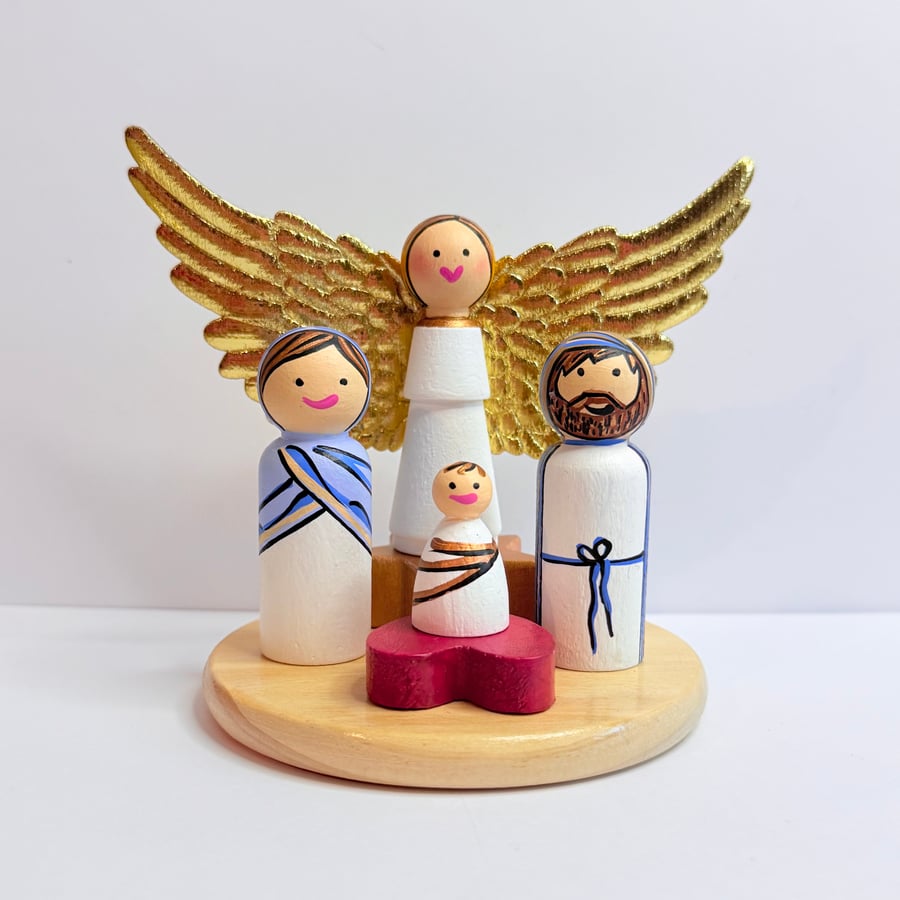 Hand painted Scandi style wooden nativity scene in gold, light blue and white. 