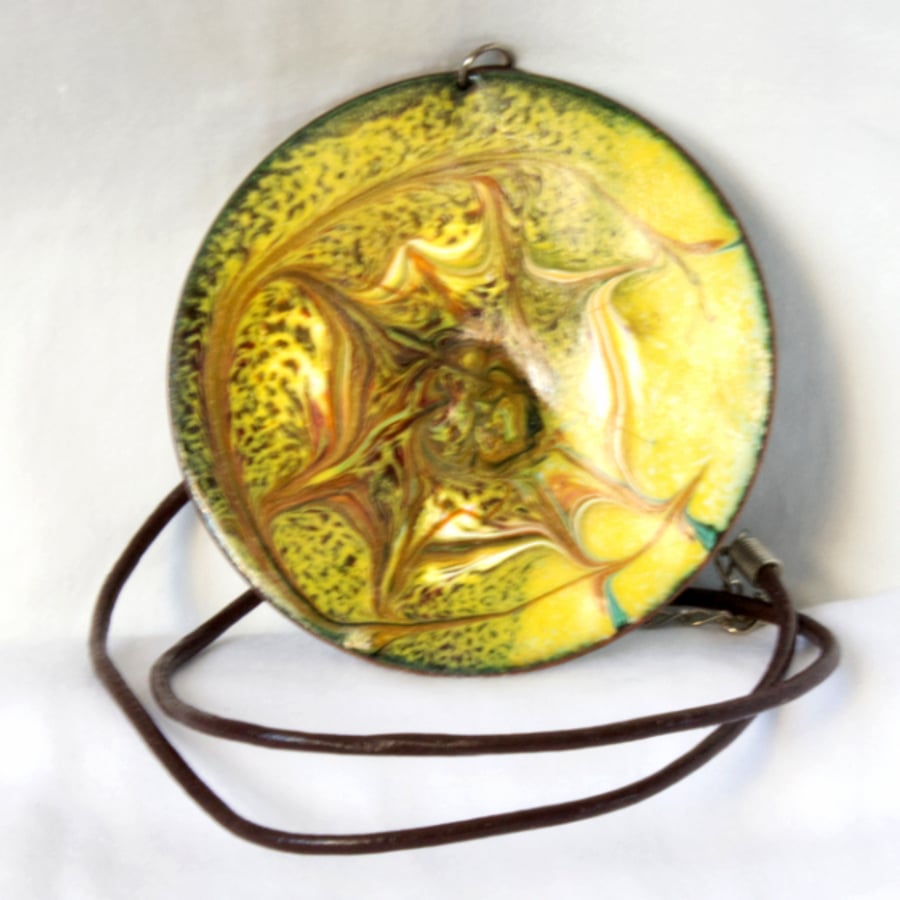 pendant - round, scrolled Black  Brown and White on Yellow